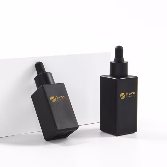 Gotero de botella de envasado de aceite vacío de vidrio cosmético para la venta